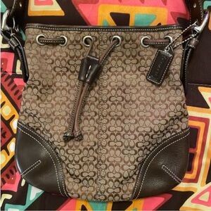 Coach brown drawstring crossbody​